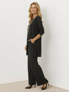 Open-front three-piece co-ord with longline cardigan, tank top, and wide-leg trousers in lightweight stretch fabric