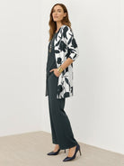 Three-piece open-front co-ord set with longline cardigan, tank top, and wide-leg trousers