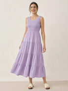 Smocked sleeveless maxi dress with tiered skirt and scoop neckline in lightweight fabric