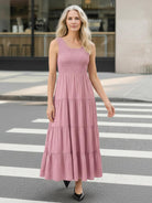 Smocked sleeveless maxi dress with tiered skirt and breathable fabric