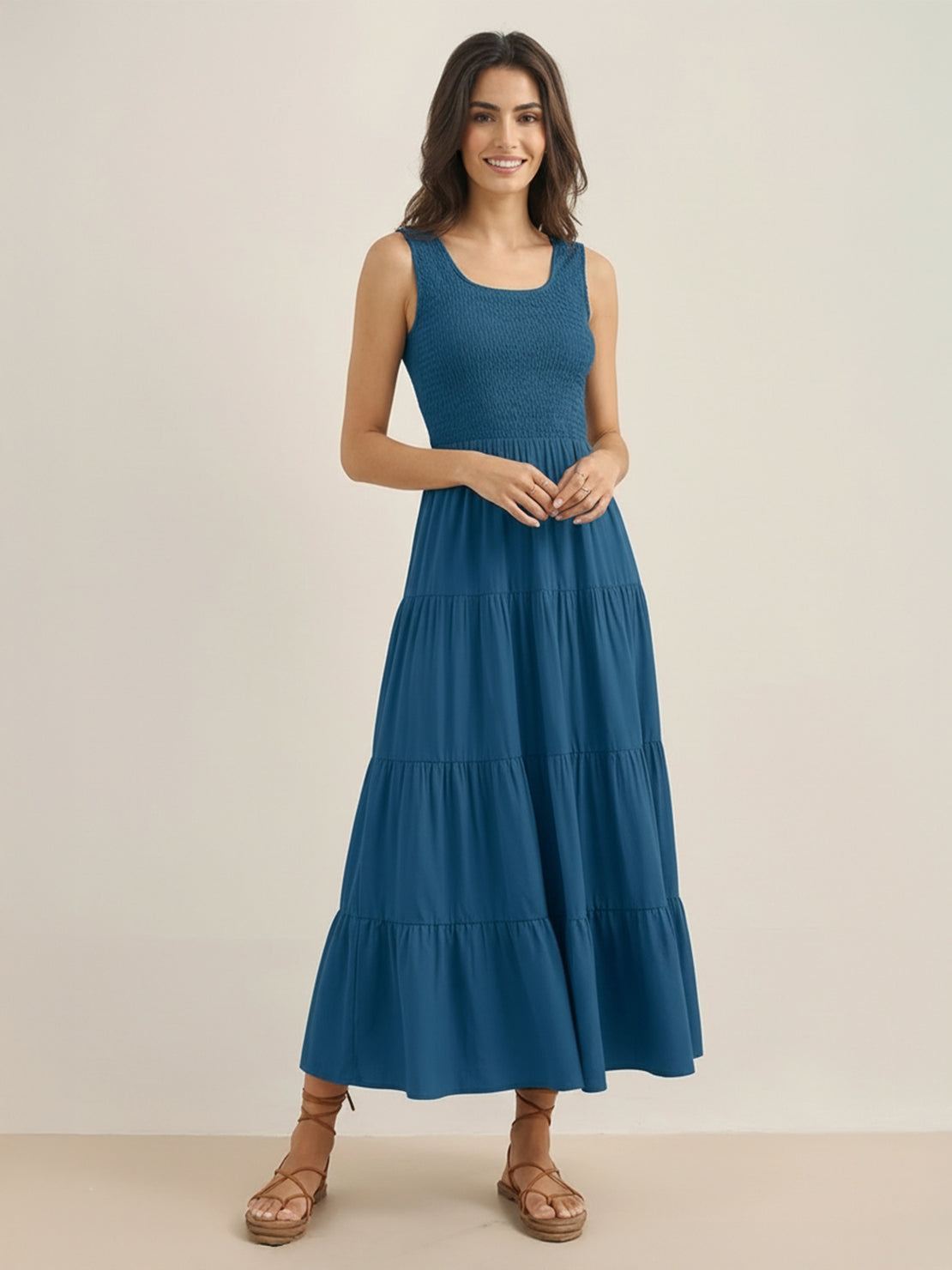 Smocked sleeveless maxi dress with tiered skirt and scoop neckline in lightweight fabric