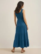 Smocked sleeveless maxi dress with tiered skirt and scoop neckline in lightweight polyester fabric