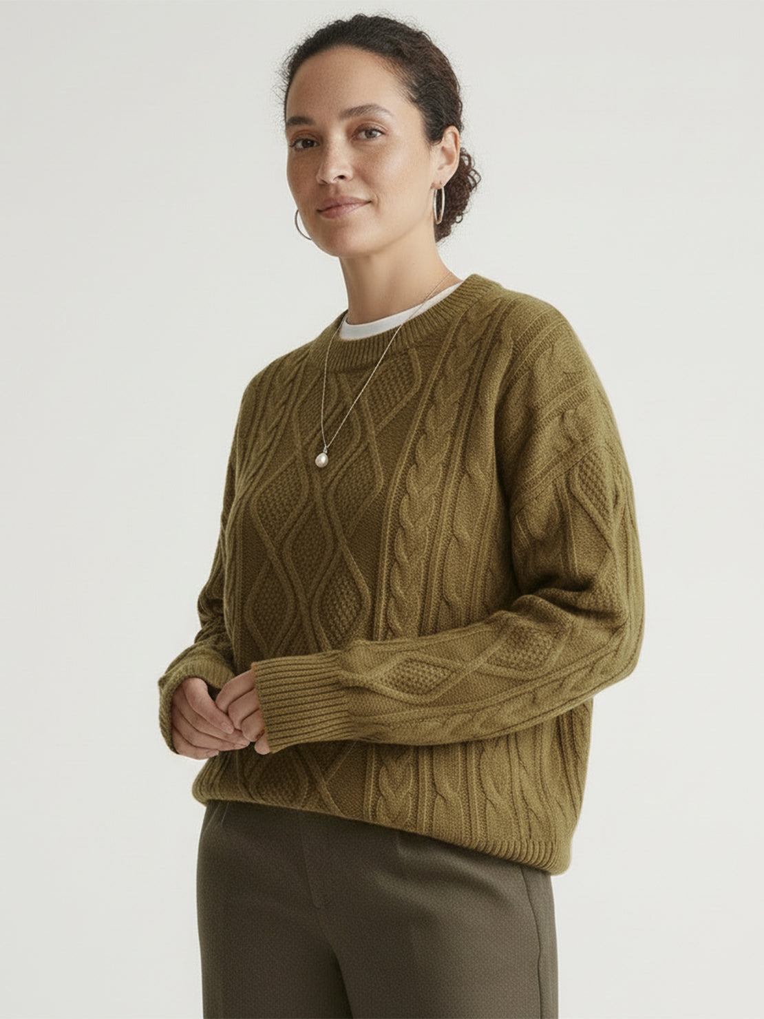 Oversized cable-knit crewneck sweater with dropped shoulders and textured diamond and rope pattern