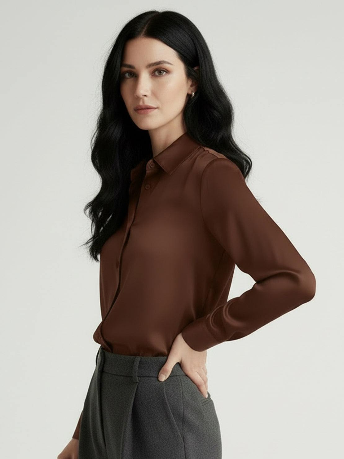 Silk-finish button front shirt with relaxed fit, traditional collar, and curved hem in smooth polyester blend fabric