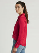 Silk-finish button front shirt with smooth fabric and relaxed fit.