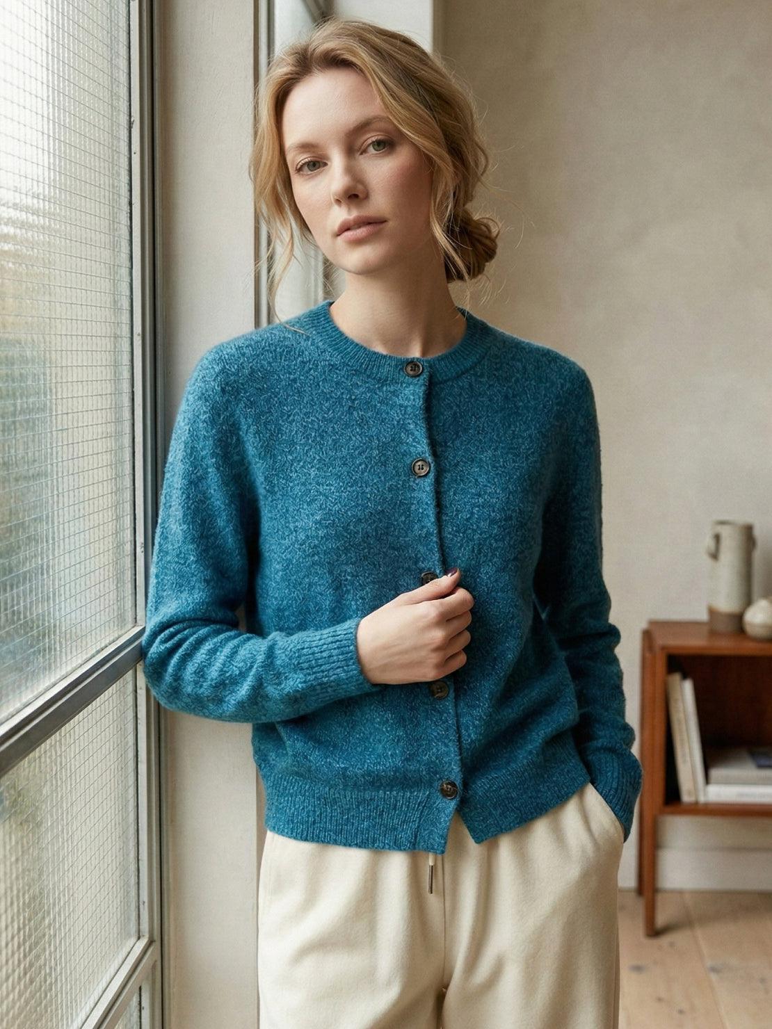 Marled knit merino wool cardigan with contrasting buttons and ribbed cuffs, soft and warm layered sweater.