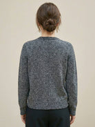 Marled knit Merino wool cardigan with contrasting buttons and ribbed cuffs, cozy layered look