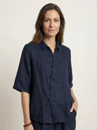 100% cotton artisan two-piece set with oversized button-front shirt and wide-leg cropped pants