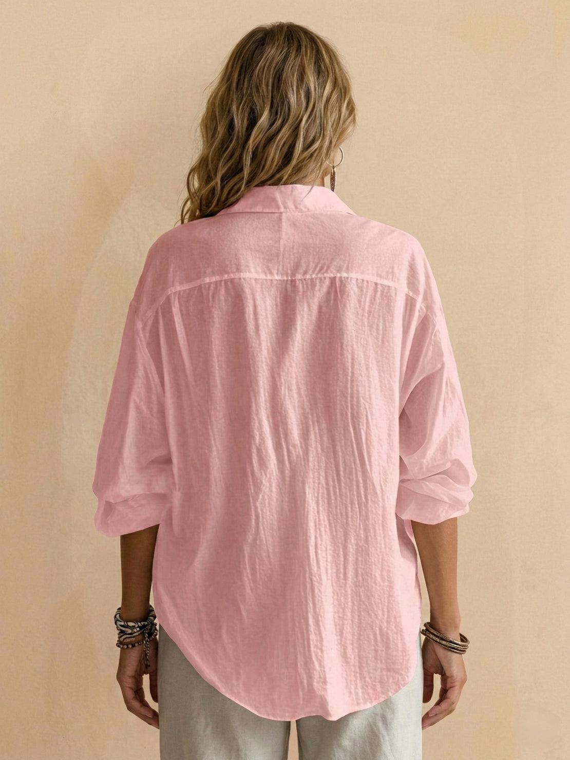 Lightweight 100% cotton popover blouse with relaxed fit and classic collar, styled over jeans