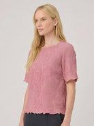 Floral Jacquard Pleated Top with 3D floral texture, flutter sleeves, and relaxed A-line fit