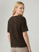 Floral Jacquard Pleated Top with flutter sleeves and 3D floral texture in relaxed A-line silhouette