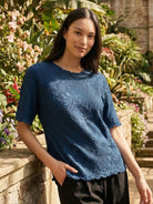 Floral Jacquard Pleated Top with 3D floral texture and flutter sleeves