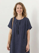 Women’s 100% linen pocket midi dress with relaxed fit, short sleeves, and side slits