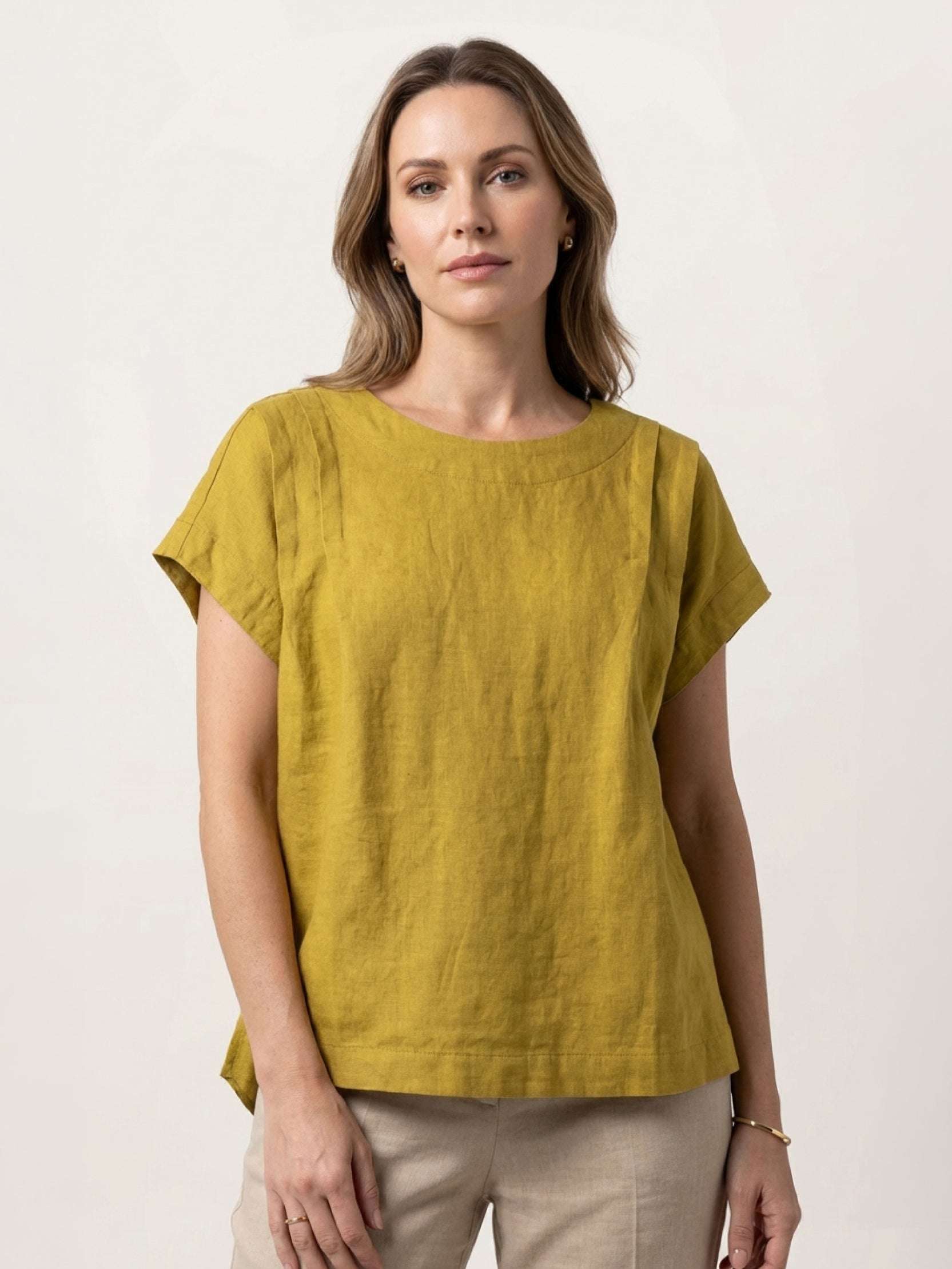 100% linen boxy cap-sleeve top with round neck and hip-length hem in natural linen texture