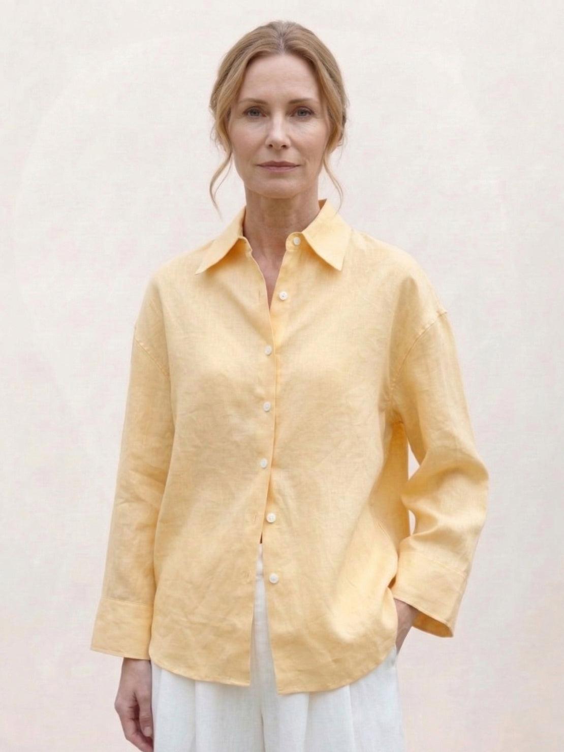 100% linen dropped-shoulder loose-fit shirt with long rollable sleeves and side slits