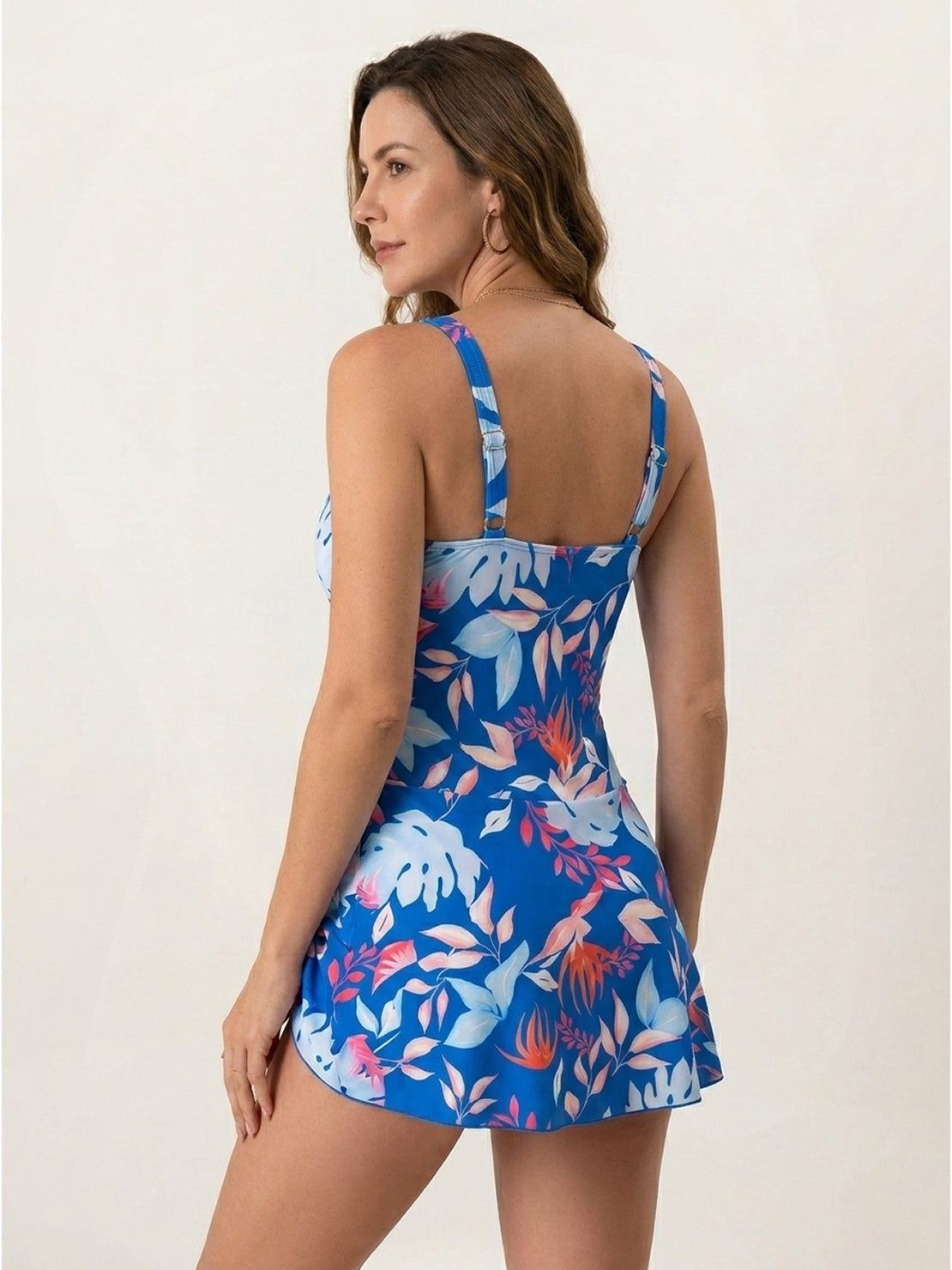 Ruched wrap one-piece swimdress with adjustable straps and tie-front skirt
