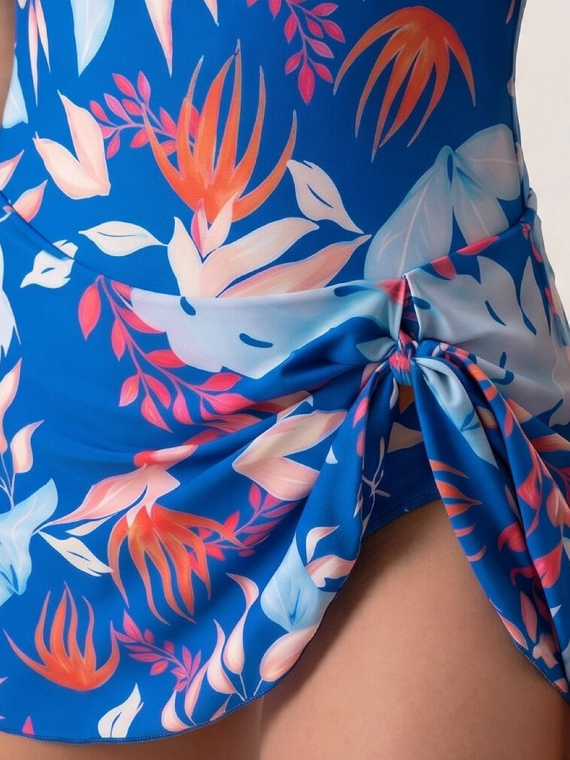 Ruched wrap one-piece swimdress with adjustable straps and tie-front skirt for comfortable active wear