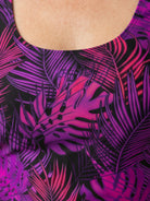 Adjustable ruched tankini set with side ruching, adjustable wide straps, and classic black bikini bottoms