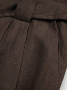 white 100% linen belted shorts with relaxed wide-leg fit and high-rise waist