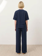100% cotton two-piece set with button-front top and wide-leg pants in solid colors