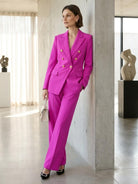 Double-breasted blazer with gold lion-head buttons and wide-leg trousers co-ord set in structured suiting fabric