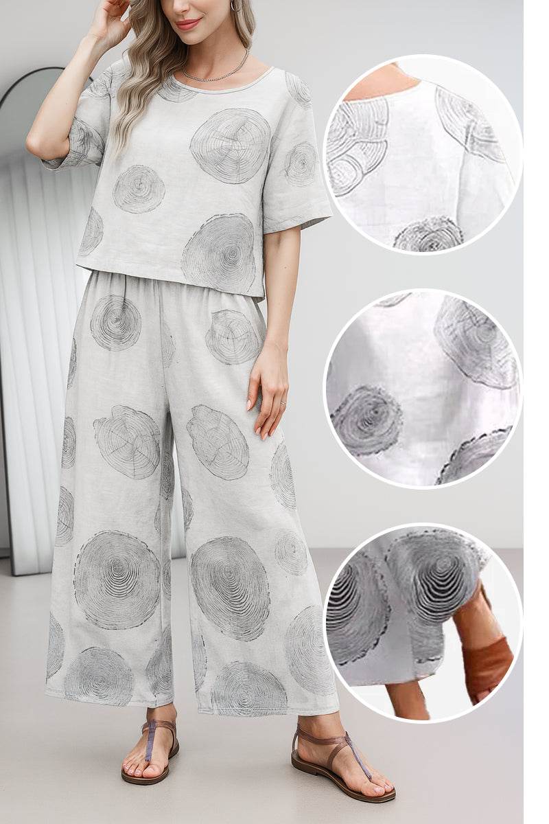 woman wearing Breezy Meadow two-piece set with relaxed top and wide-leg trousers in light fabric