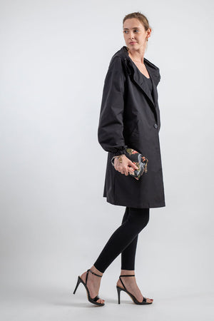 Water-Resistant Oversized Windbreaker rain jacket black long fit with hood worn by woman
