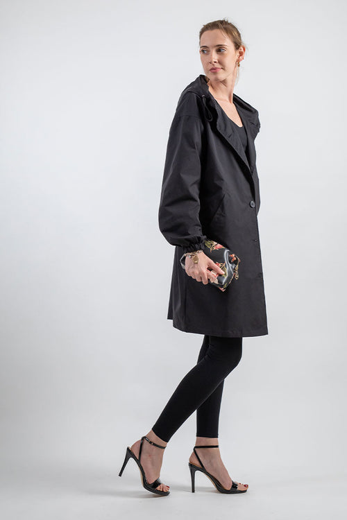Water-Resistant Oversized Windbreaker rain jacket black long fit with hood worn by woman