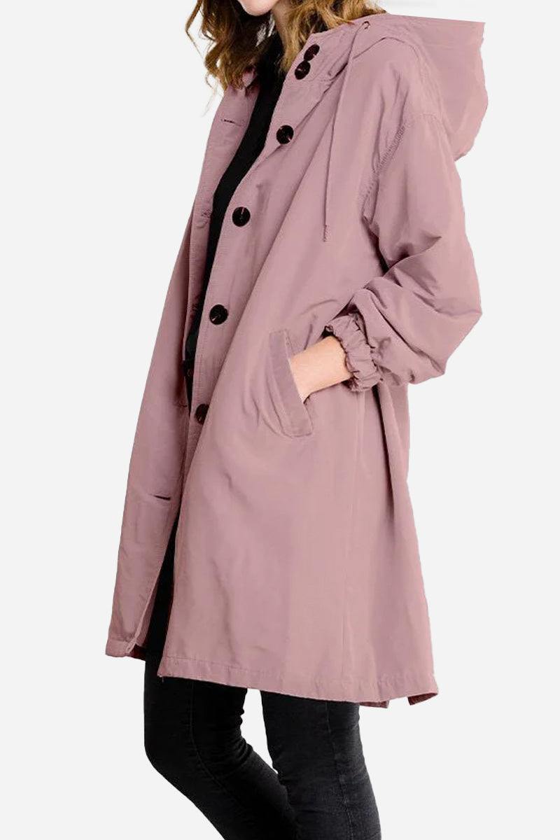 Water resistant oversized windbreaker rain jacket in mauve with hood and button closure