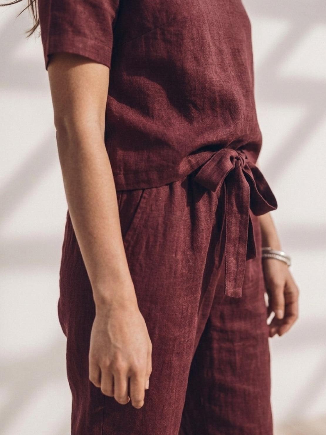 woman wearing relaxed cotton linen set with short-sleeve top and straight-leg pants in monochrome tones