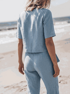 Monochrome cotton-linen set with relaxed short-sleeve top and straight-leg pants in breathable fabric