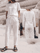 Cotton-linen set with relaxed short-sleeve top and straight-leg pants in breathable monochrome fabric