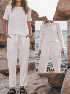 Three-piece cotton-linen set featuring a relaxed short-sleeve top and straight-leg pants in a breathable monochrome fabric