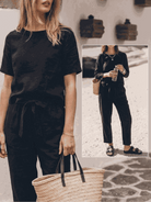 woman wearing relaxed cotton-linen set with short-sleeve top and straight-leg pants in monochrome tone