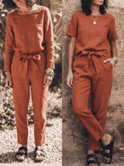 Cotton-linen set featuring relaxed short-sleeve top and straight-leg pants in breathable monochrome fabric