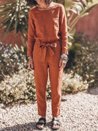 woman wearing cotton-linen monochrome relaxed longline top and wide-leg pants set