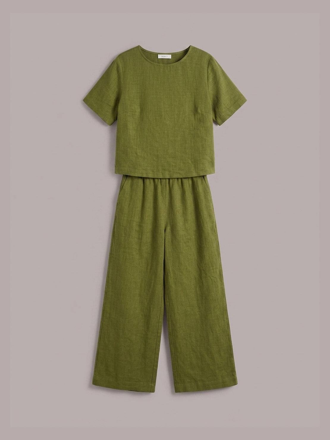 Light beige loose fit co-ord set with soft-tailored top and wide-leg bottoms made of breathable cotton.