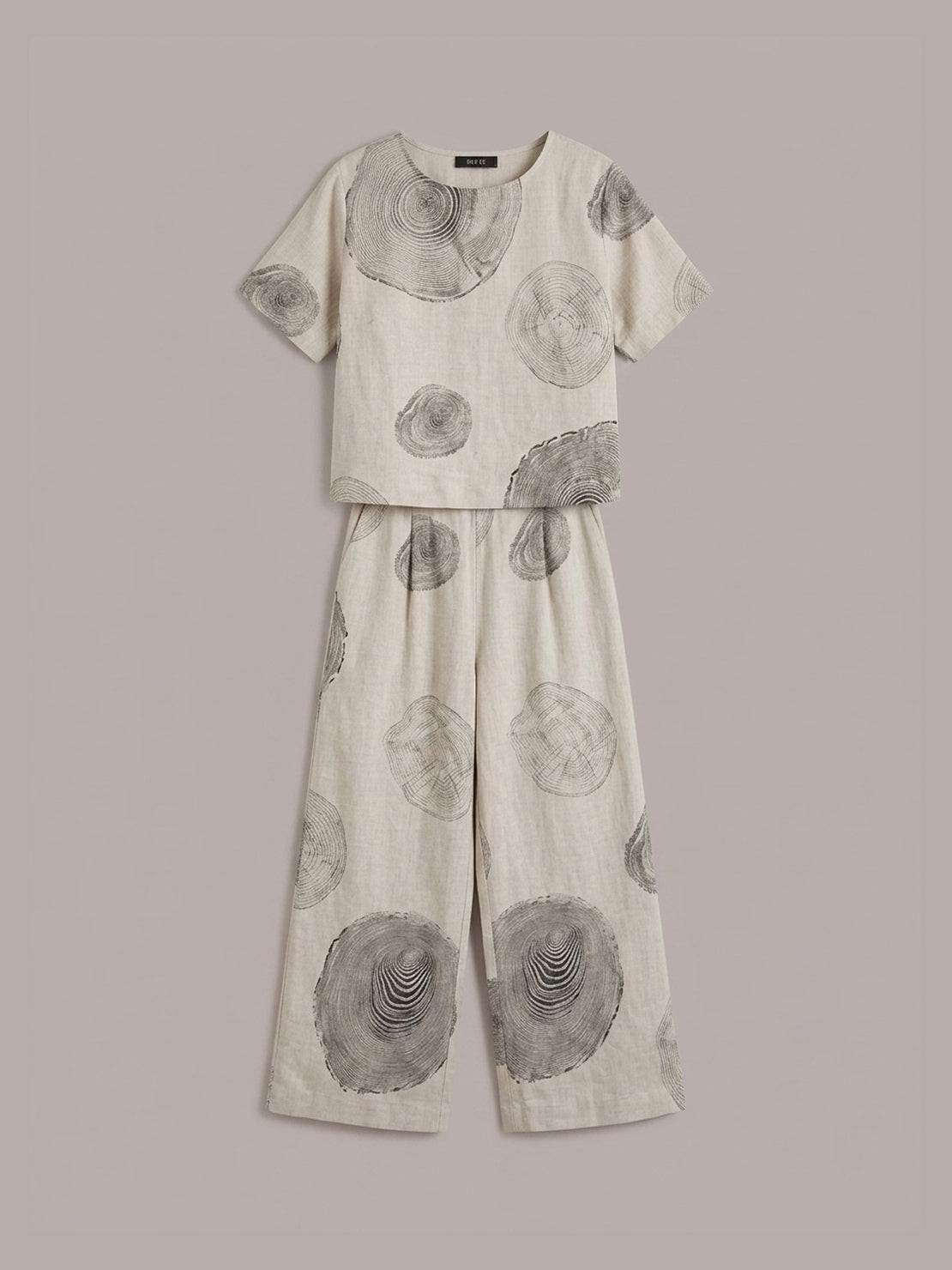 Loose fit co-ord set with soft-tailored top and wide-leg cotton bottoms in light beige