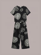 Loose fit co-ord set with soft-tailored top and wide-leg cotton bottoms in light beige color