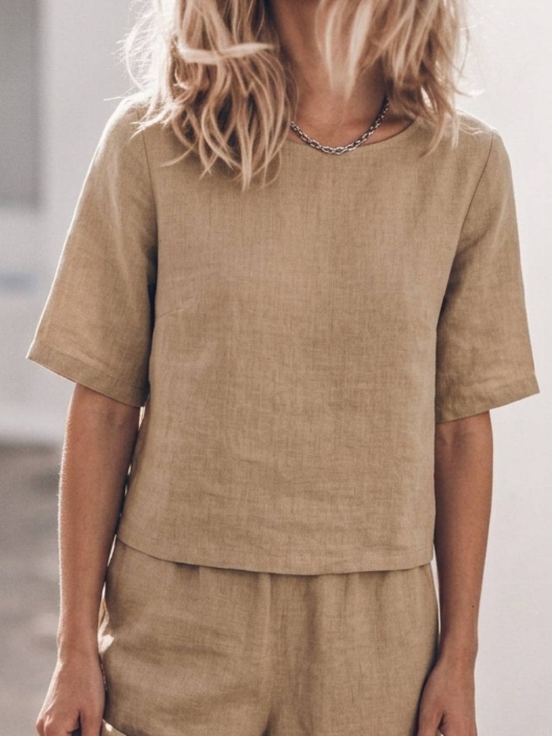 Light beige loose fit co-ord set with soft-tailored top and wide-leg bottoms in breathable cotton fabric
