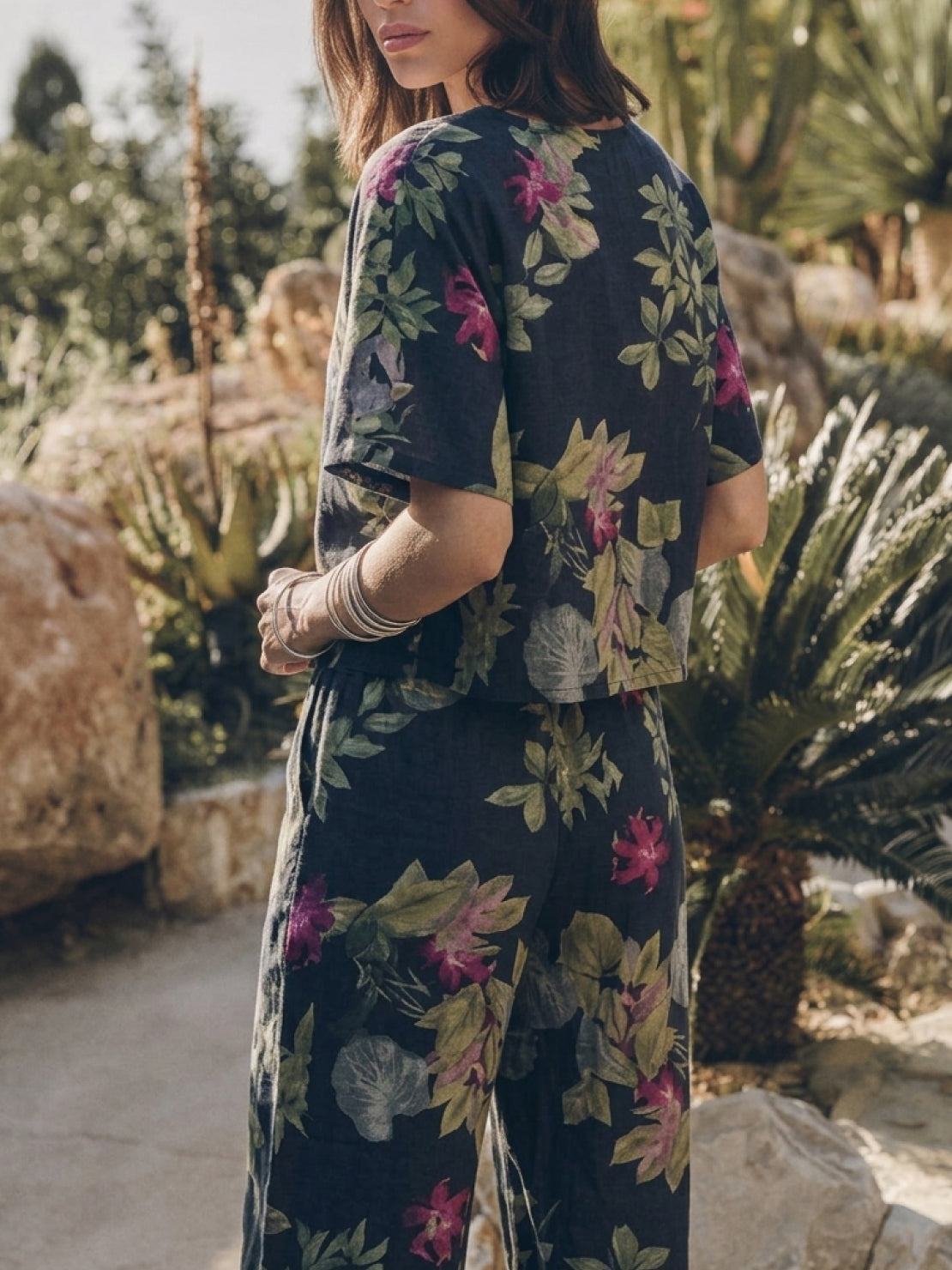 woman wearing soft-tailored loose fit co-ord set with wide-leg bottoms in light cotton fabric