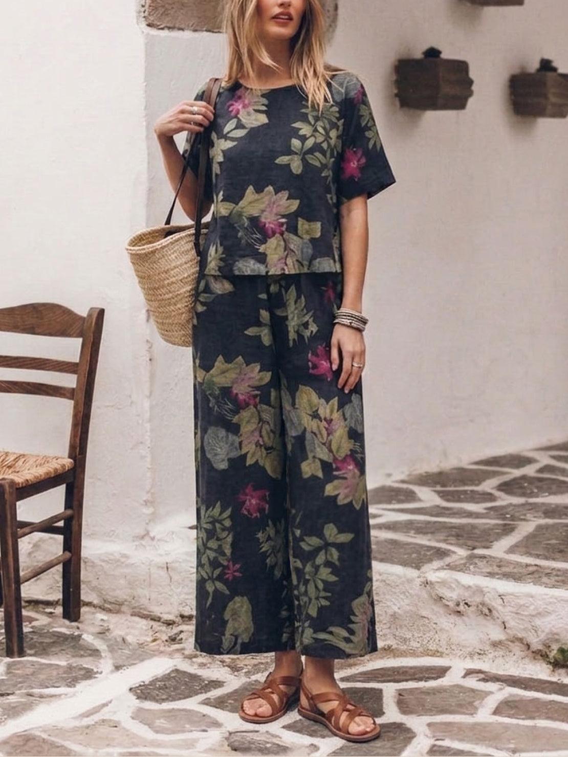 woman wearing soft-tailored loose fit co-ord set with wide-leg cotton trousers in light color