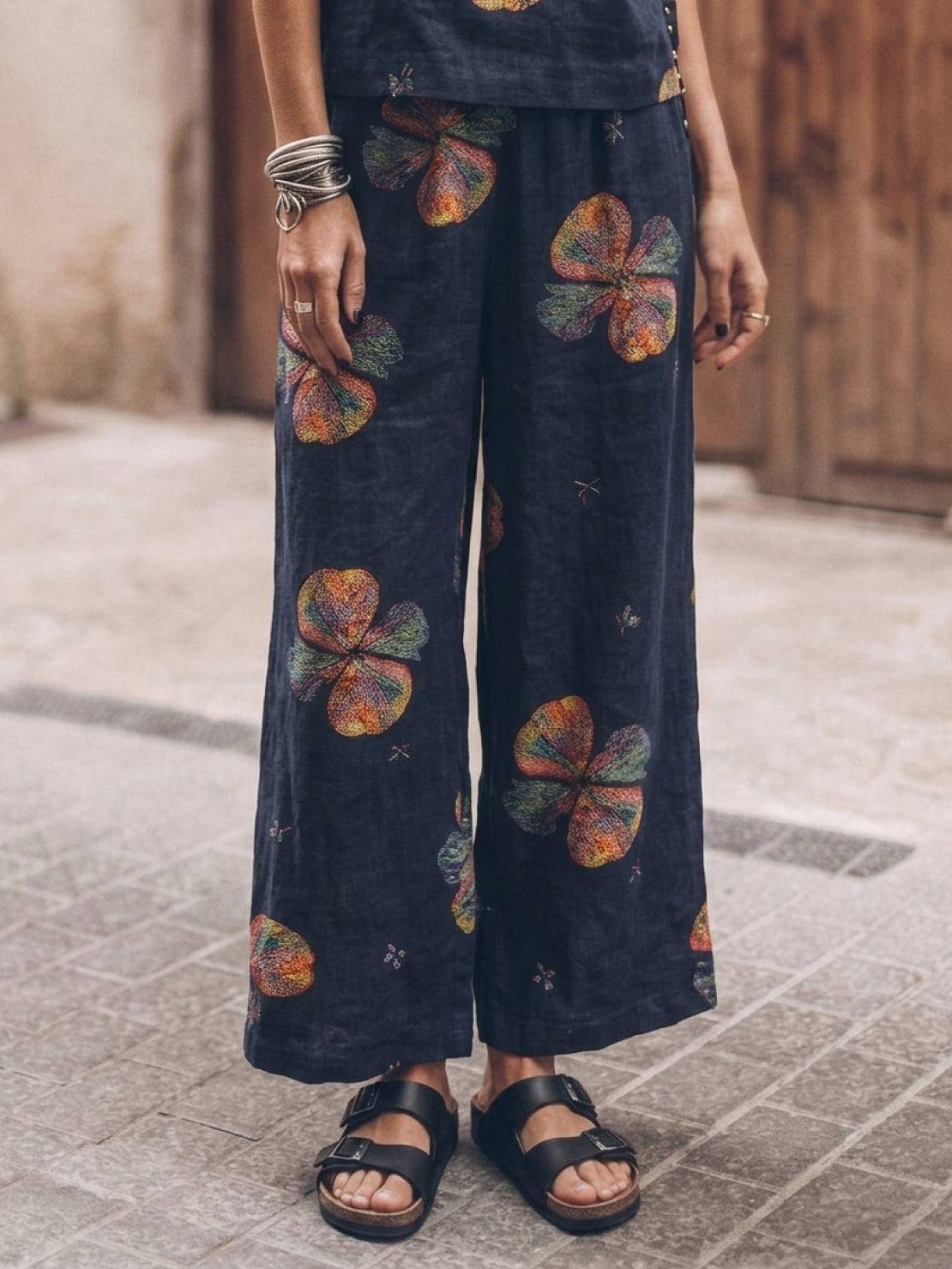 woman wearing soft-tailored loose fit co-ord set with wide-leg bottoms in light cotton fabric
