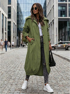 Minimalist hooded coat with oversized fit for travel and lightweight warmth