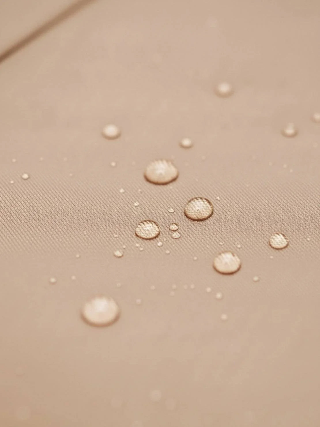 Women's water-repellent A-line hooded raincoat with belt and insulated lining