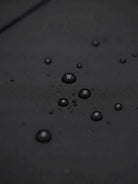 Water-repellent A-line hooded raincoat with feminine fit and insulated lining for warmth and style