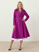 Elegant water-repellent A-line hooded raincoat with matching belt and insulated lining for women