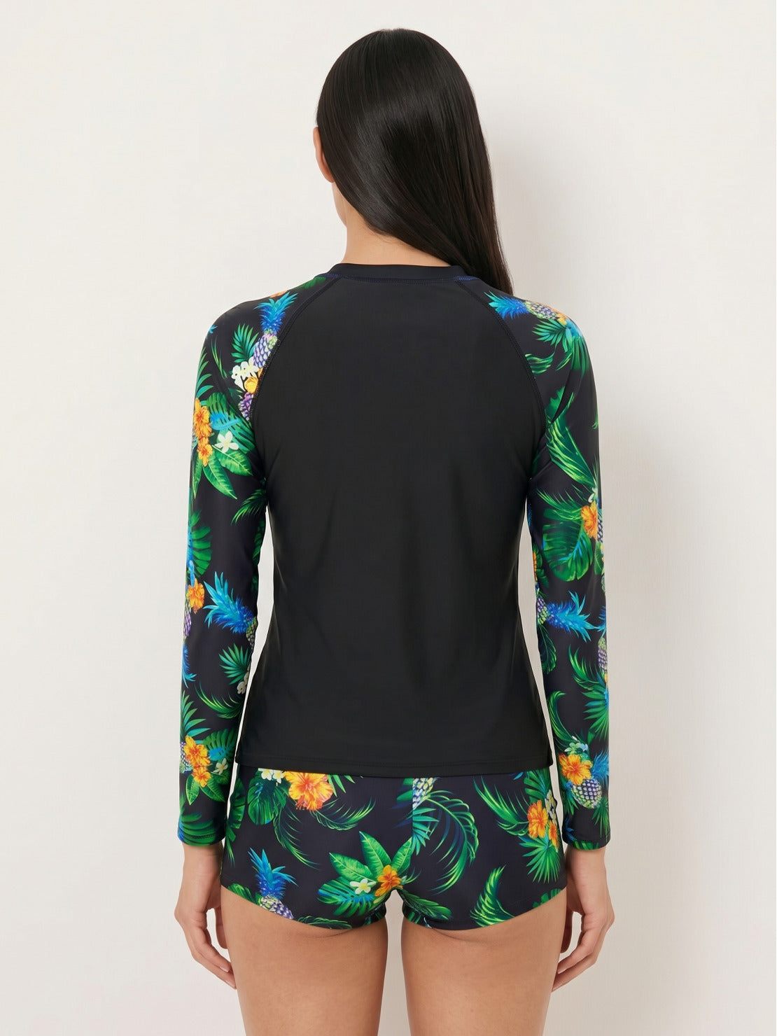 Women’s swim shorts rash guard set with long raglan sleeves and printed boyshort bottoms