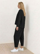Woman wearing lightweight breathable All-Day Comfort 2-Piece Outfit Set in soft polyester fabric