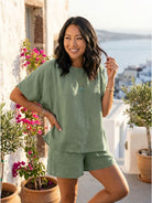 Comfy linen-like shirt and shorts two-piece set in breathable fabric, perfect for casual and versatile summer style